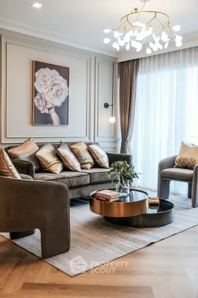 Luxurious living room with elegant decor and modern chandelier