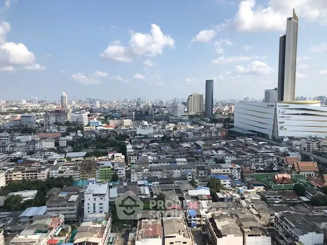 Stunning cityscape view showcasing urban skyline with modern skyscrapers and residential buildings under a clear blue sky.