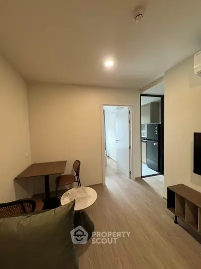 Modern apartment interior with cozy living area and open kitchen layout