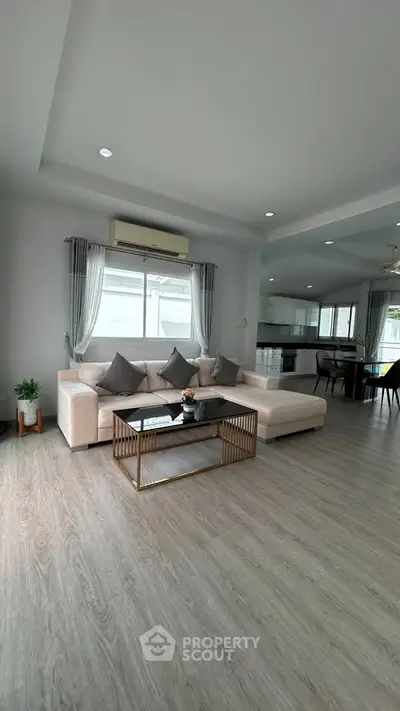 Spacious modern living room with elegant decor and open layout