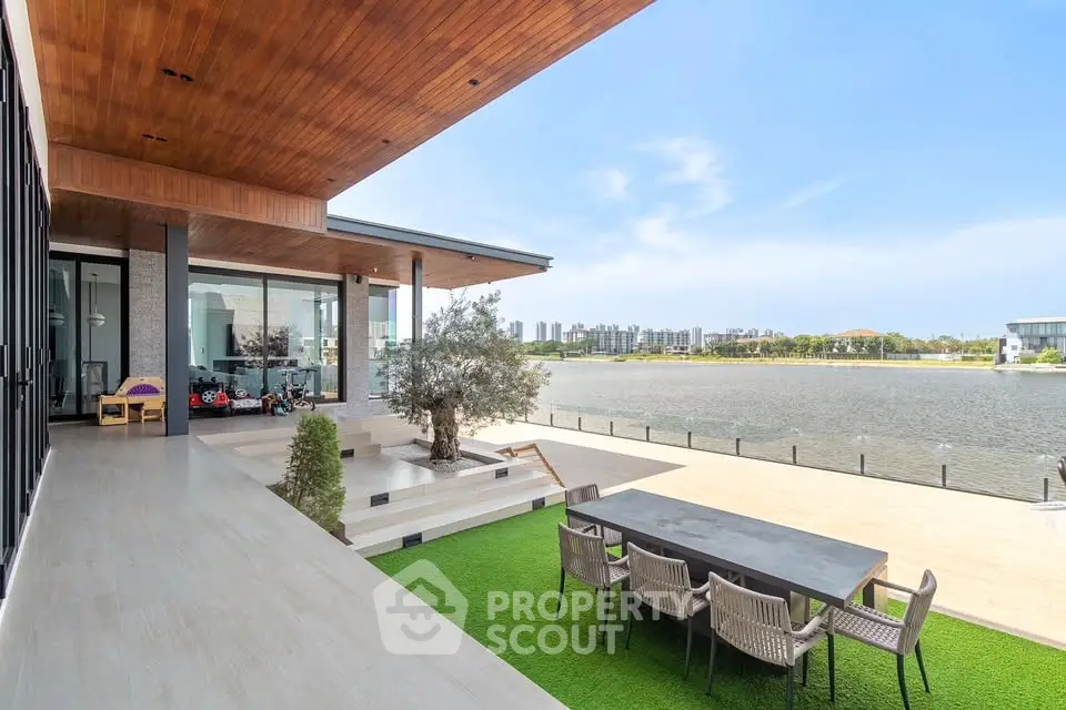 Luxurious waterfront property with spacious terrace and stunning lake view