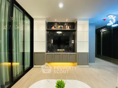 Luxurious modern living room with sleek TV unit and ambient lighting