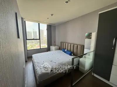 Modern bedroom with city view and stylish decor