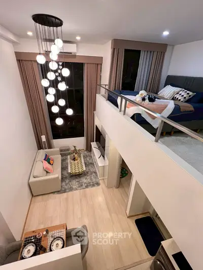 Modern loft apartment with stylish living area and cozy mezzanine bedroom.