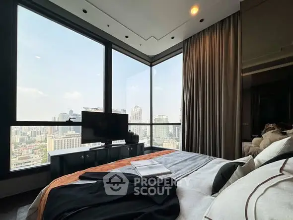 Luxurious bedroom with panoramic city view and modern decor