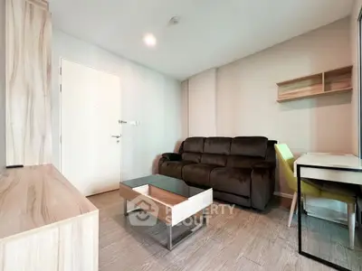 Modern living room with cozy sofa and stylish wooden furniture