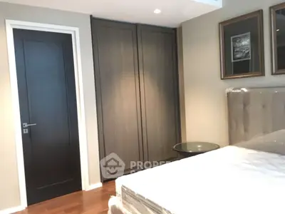 Modern bedroom with sleek wardrobe and elegant decor