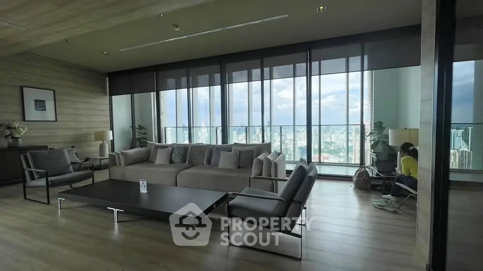 Luxurious living room with panoramic city view and modern furnishings