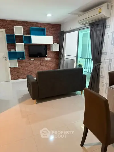 Modern living room with stylish brick wall and sleek furniture