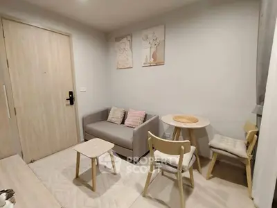 Cozy modern living room with stylish furniture and soft lighting, perfect for relaxation and entertaining.