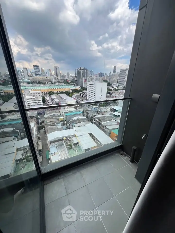 Stunning cityscape view from a modern high-rise balcony, perfect for urban living enthusiasts.