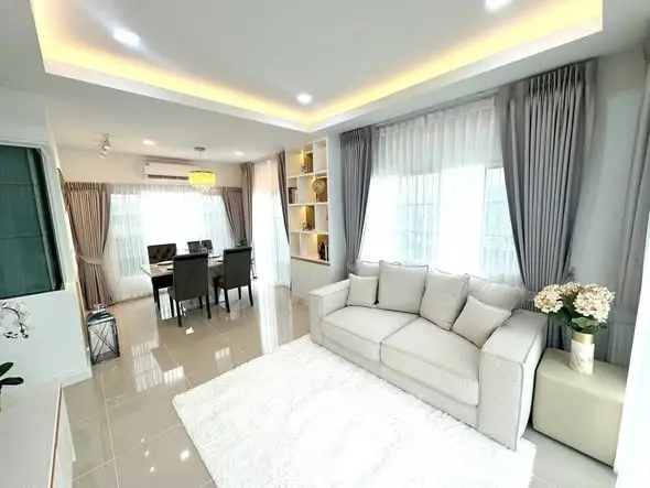 Spacious modern living room with elegant decor and natural light