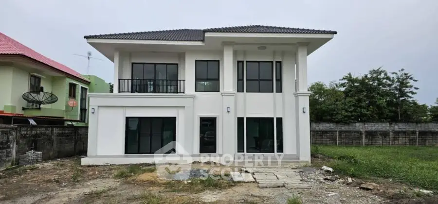 Modern two-story house with spacious yard and contemporary design