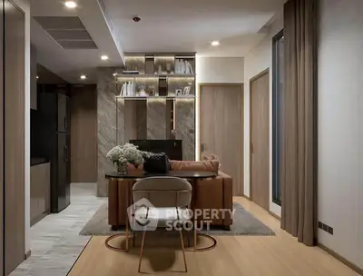 Modern living room with stylish decor and open kitchen layout