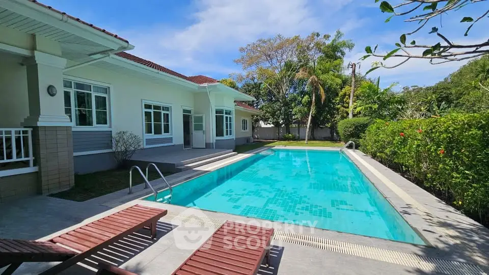 Luxurious villa with private pool and lush garden, perfect for relaxation and entertaining.