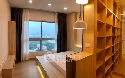 Modern bedroom with panoramic city view and stylish wooden shelving.