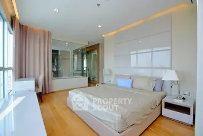 Luxurious modern bedroom with floor-to-ceiling windows and elegant decor