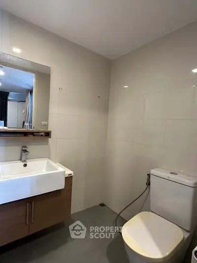 Modern bathroom with sleek fixtures and neutral tones