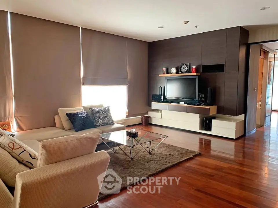 Spacious modern living room with elegant decor and hardwood floors