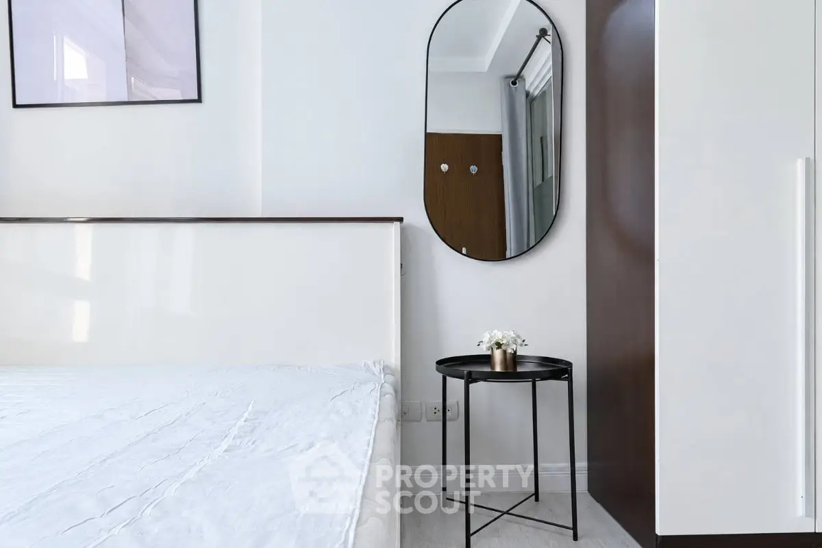 Modern minimalist bedroom with sleek furniture and stylish decor