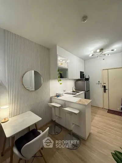 Modern compact kitchen with open layout and stylish decor