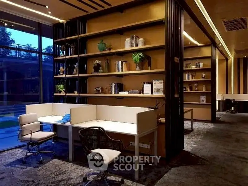 Modern co-working space with stylish furniture and large windows