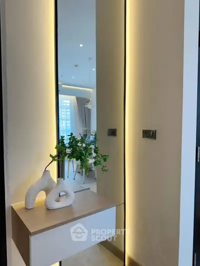 Modern interior with stylish decor and ambient lighting in a contemporary apartment.