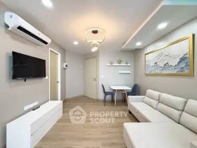 Modern living room with stylish decor and cozy seating area