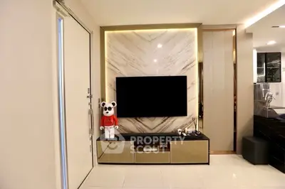 Modern living room with sleek TV setup and stylish decor