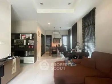 Modern living room with open layout and stylish furniture in a contemporary apartment.