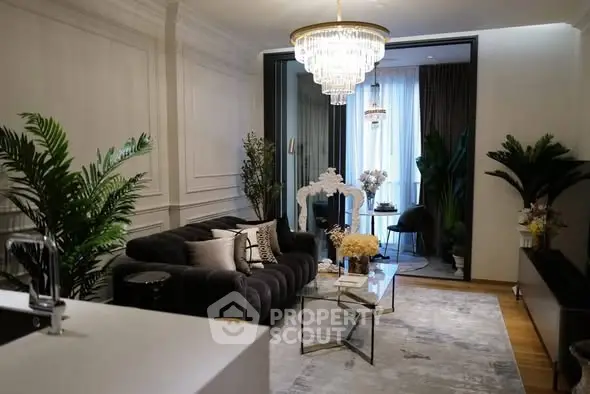 Luxurious living room with elegant chandelier and modern decor