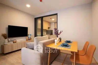 Modern living room with cozy dining area and stylish decor