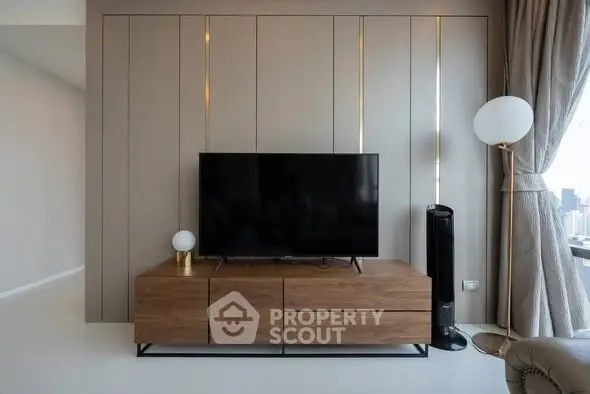 Modern living room with sleek TV unit and stylish decor