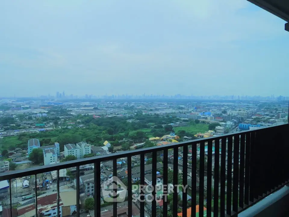 Stunning cityscape view from a high-rise balcony, perfect for urban living enthusiasts.