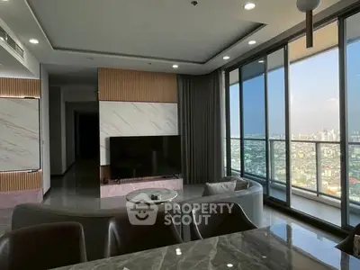 Luxurious modern living room with panoramic city view and elegant decor