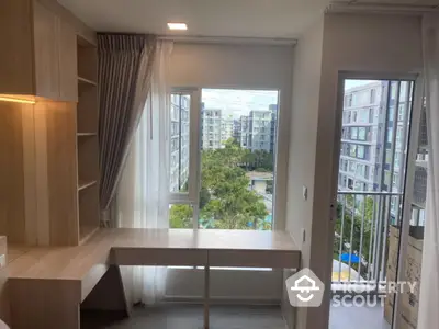 Modern study room with balcony view in urban apartment