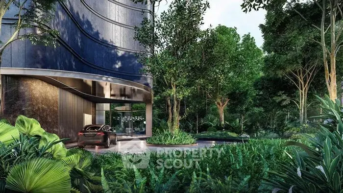Luxurious modern building entrance surrounded by lush greenery and sleek architecture.