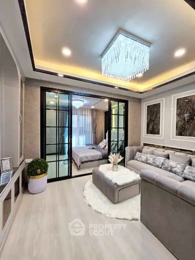 Luxurious living room with elegant decor and modern lighting