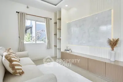 Modern living room with elegant decor and natural light