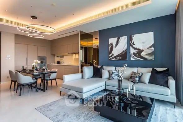 Luxurious modern living room with elegant decor and open kitchen layout