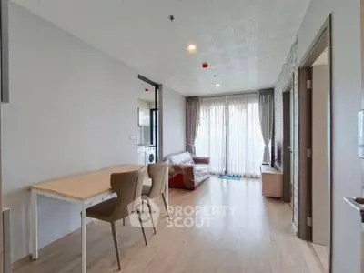 Spacious modern living room with natural light and stylish furniture