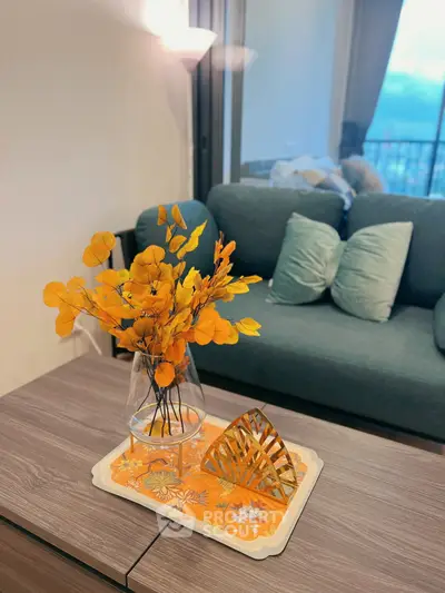 Stylish living room with modern decor and cozy sofa, perfect for relaxation and entertaining guests.