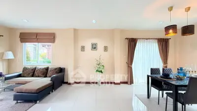 Spacious living room with elegant dining area and modern decor