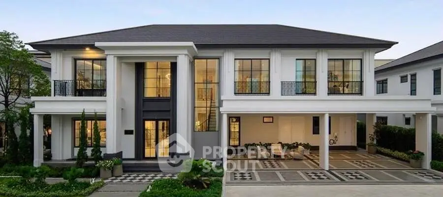 Luxurious modern two-story house with elegant facade and spacious driveway