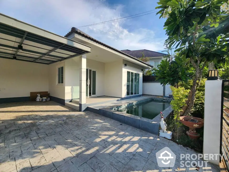 Charming modern house with private pool and spacious patio in serene neighborhood.