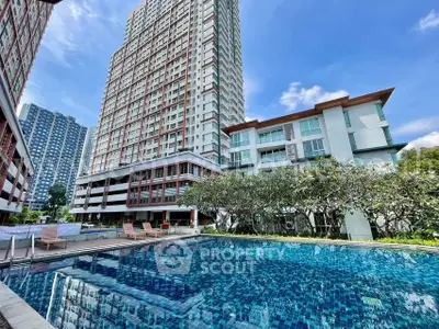 Luxurious high-rise apartment with stunning pool and garden view