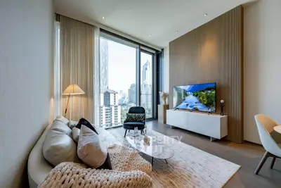 Luxurious modern living room with stunning city view and elegant decor