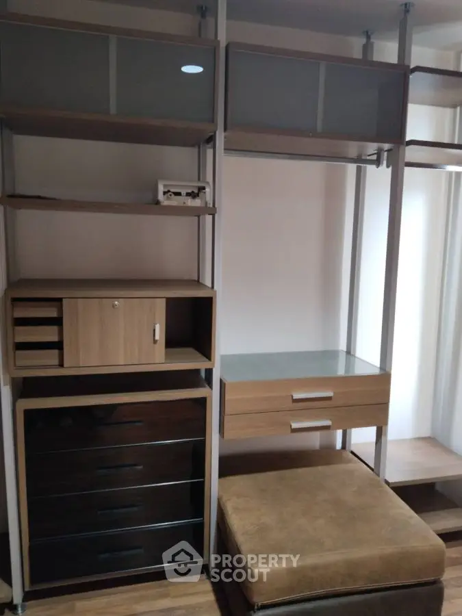 Modern storage unit with sleek design and ample shelving in stylish interior.