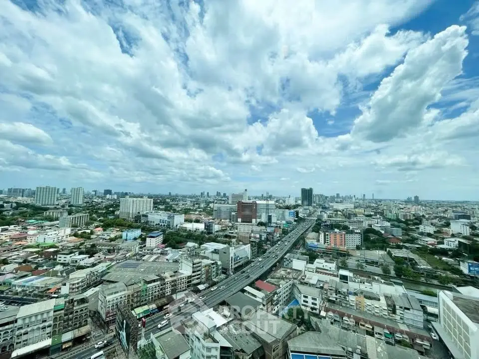 Stunning cityscape view from high-rise building showcasing urban skyline and expansive horizon.