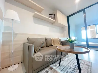 Modern living room with stylish sofa and wooden accents